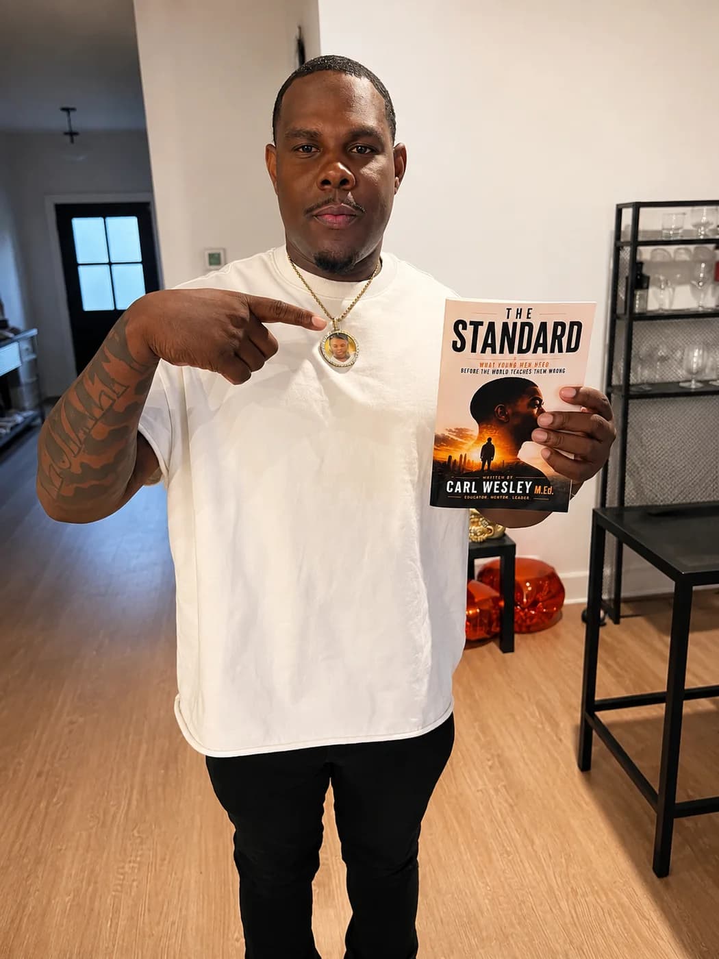 Reader holding The Standard by Carl Wesley